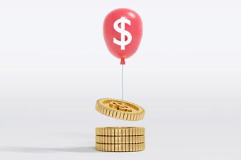 Coin being lifted into the air by a ballon marked with a dollar sign