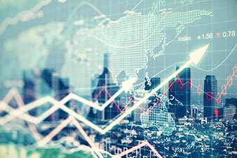 Arrows on a graph superimposed over a map of the world and a cityscape
